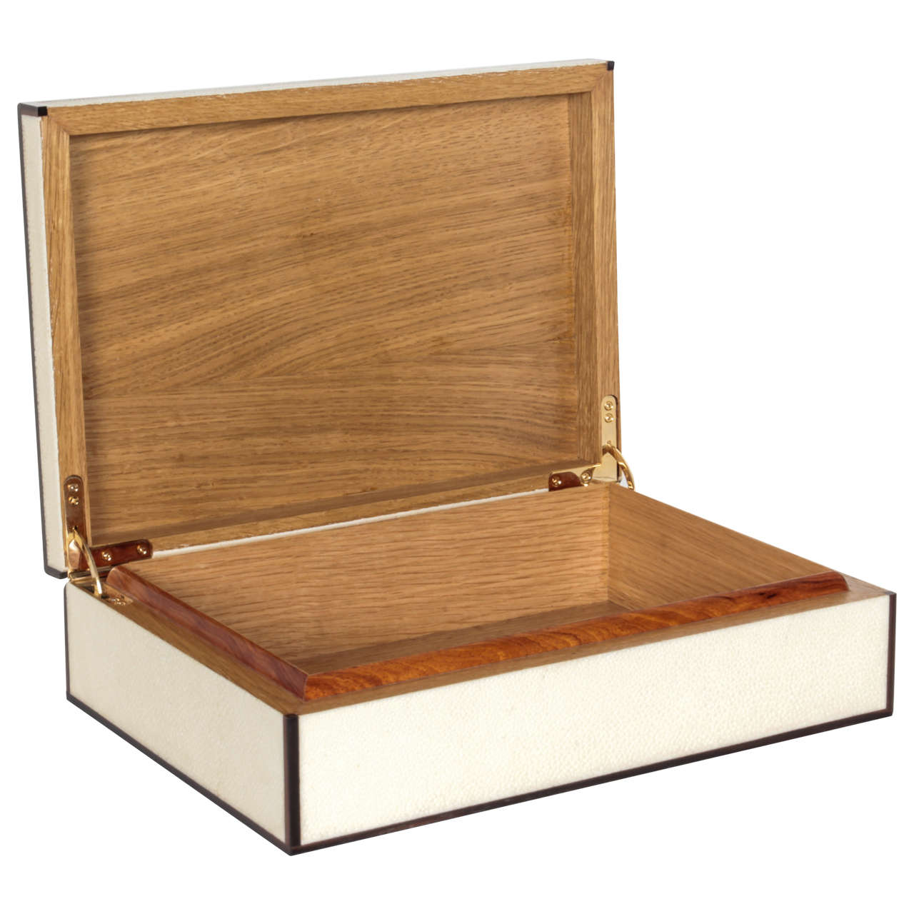 A beautiful shagreen box in natural stingray with ebony wood trim. Hinged, with a wood interior.