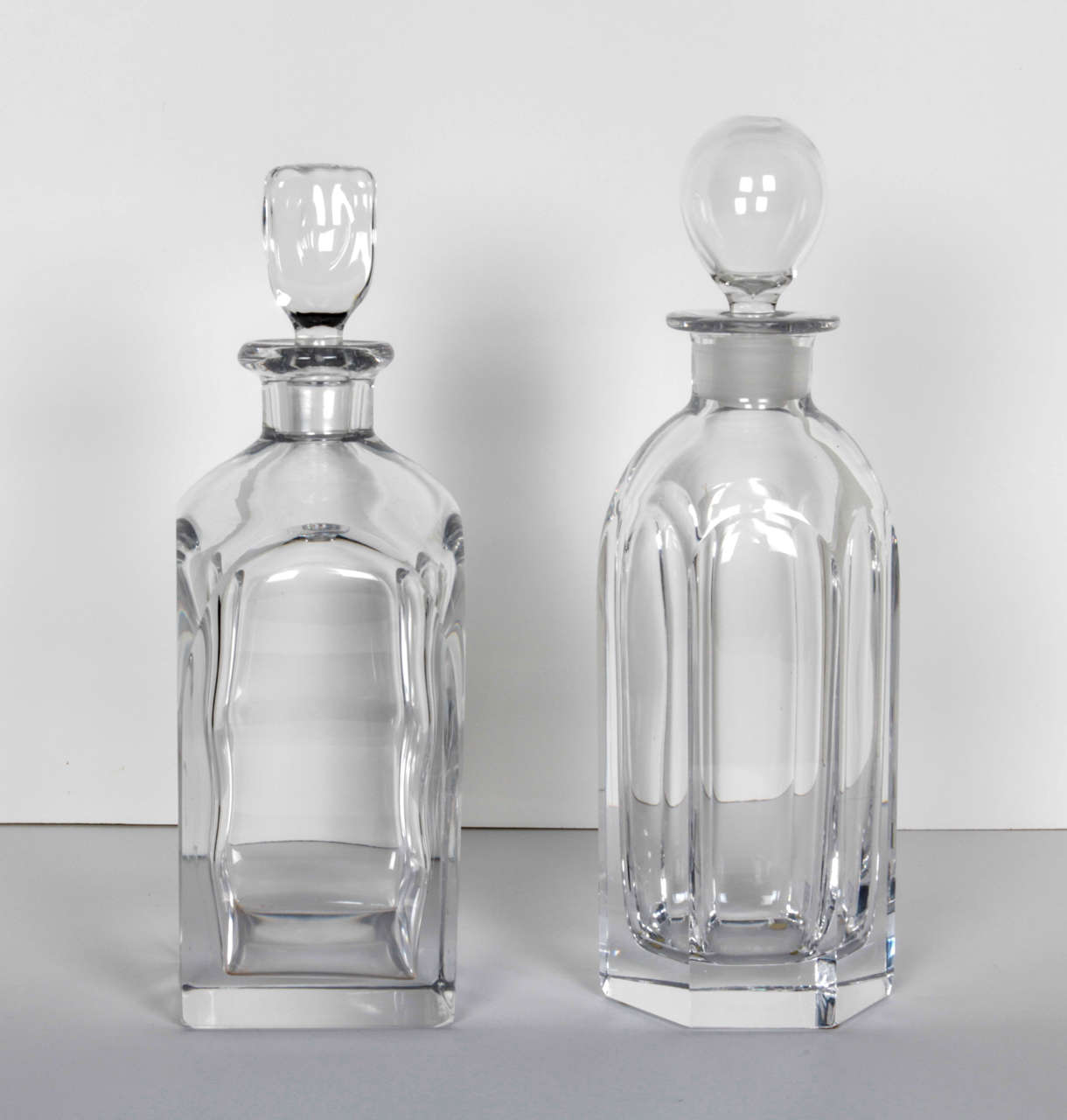 A pair of crystal Orrefors decanters. Signed. Can be purchased separately.

Left: 3.5
