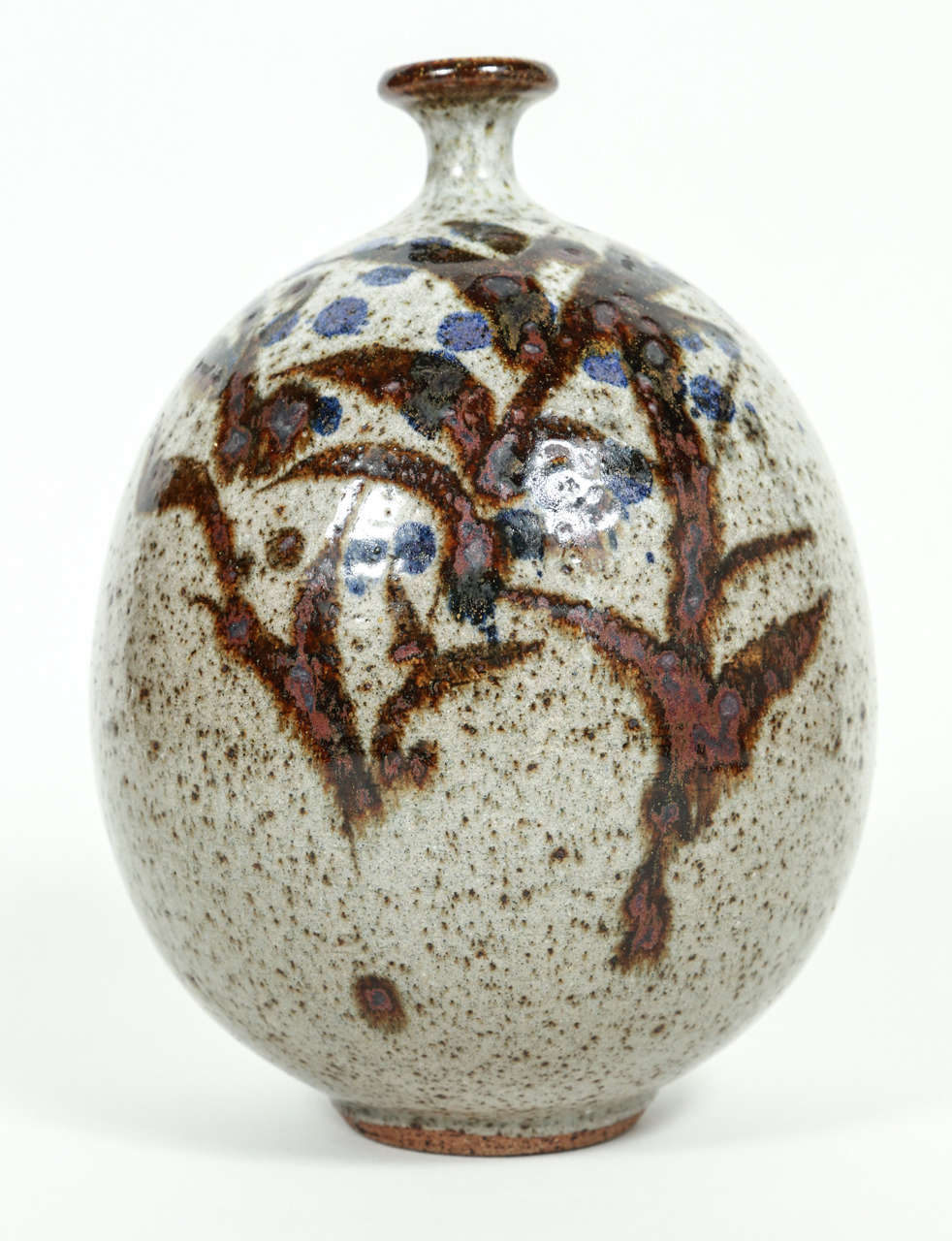 Early stoneware bottle vase by Peter Voulkos. Made in Montana, circa 1954. This rare and early example of Voulkos's work was selected for the 1955 California Designed exhibition, which originated at the Long Beach Museum of Art and later traveled to