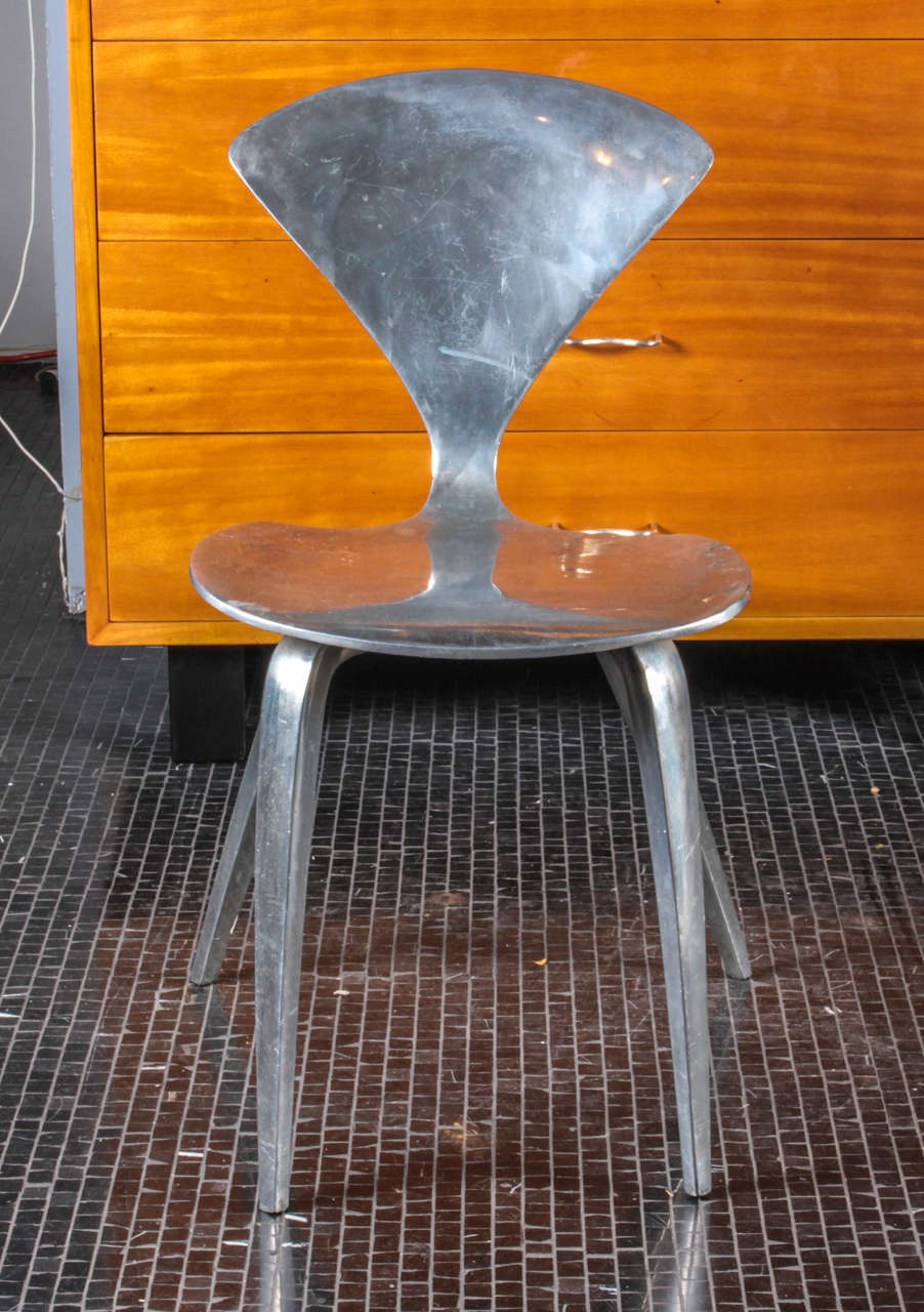 Pair of rare and unusual, polished aluminum Norman Cherner chairs.