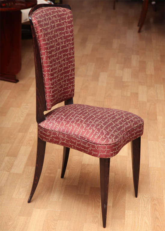 Set of 6 Art Deco dining chairs. Wood frame surrounding upholstered back and seat.