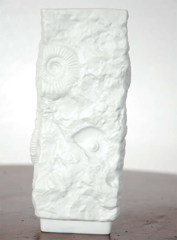 White bisque Kaiser vase in a fossil mitof. Perfect condition.<br />
Gloss porcelain interior. Numbered on bottom 131.