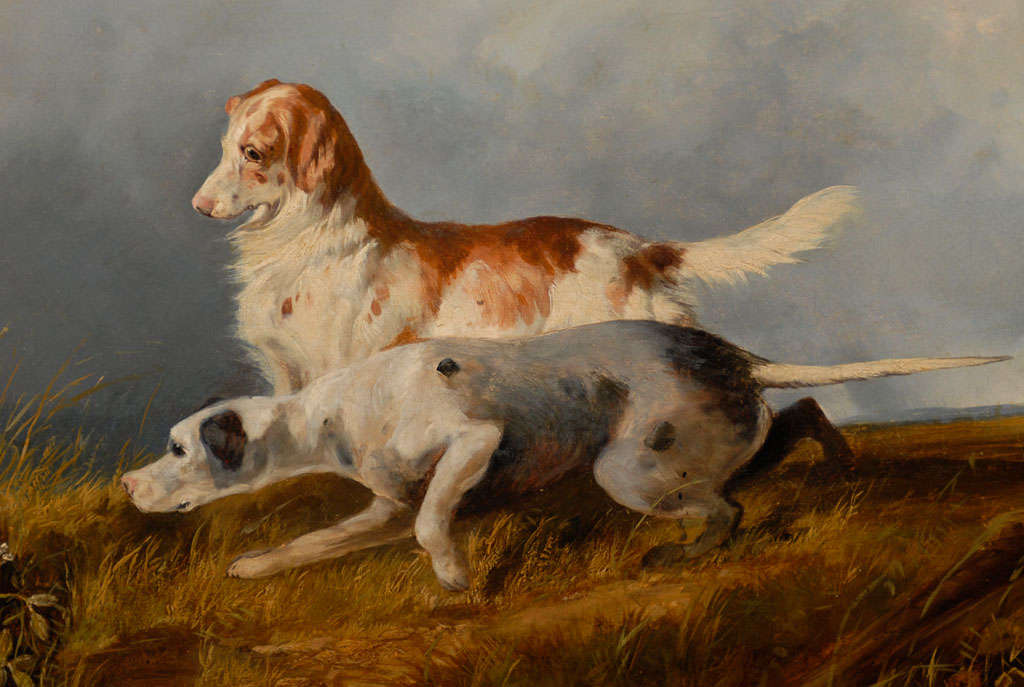 This English James Charles Morris mid-19th century oil painting features two sporting dogs in a landscape. The centre of the composition is occupied by the two dogs, obviously engaged in hunting. The grey cloudy sky in the background and the