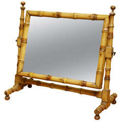 A Faux Bamboo Painted Table Top Swivel Mirror