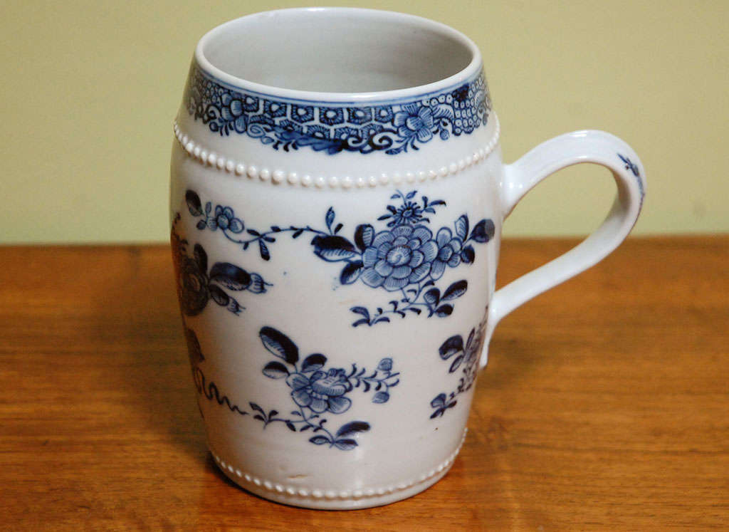A Chinese Export Blue and White Porcelain Mug with stylized floral decoration, c. 1800