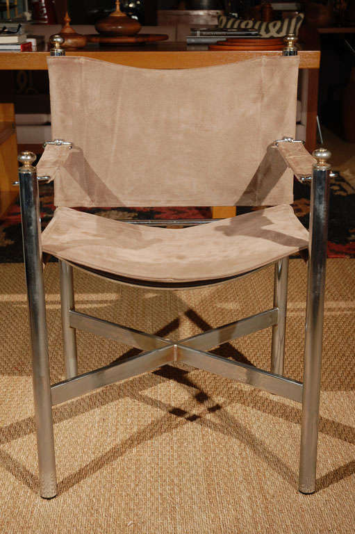 Gorgeous set of four directors' chairs from Pace International, newly upholstered in a sumptuous putty-grey/brown suede. Very well-made and comfortable with solid chrome steel tubing and golden brass finials. A wonderful collection of beautiful