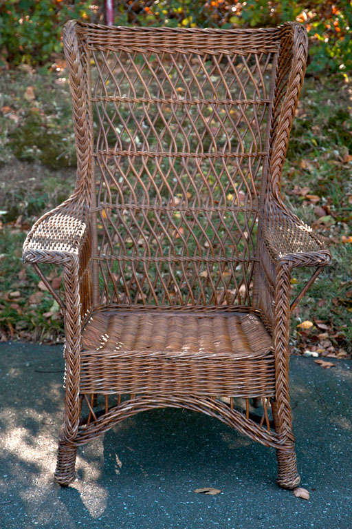 Antique reed wingback chair in original natural finish.