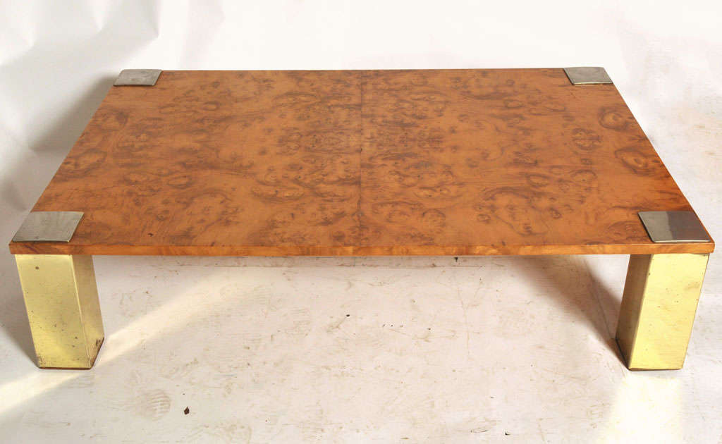 Coffee table in mappa burl wood veneer. 
Nice patina on the brass and chrome details.