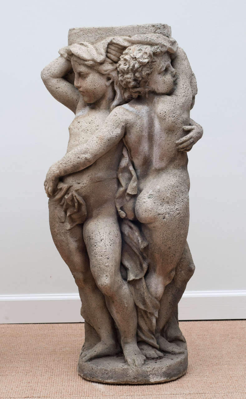 Pair of  Embracing Putti Stone figures In Excellent Condition For Sale In Kensington, MD