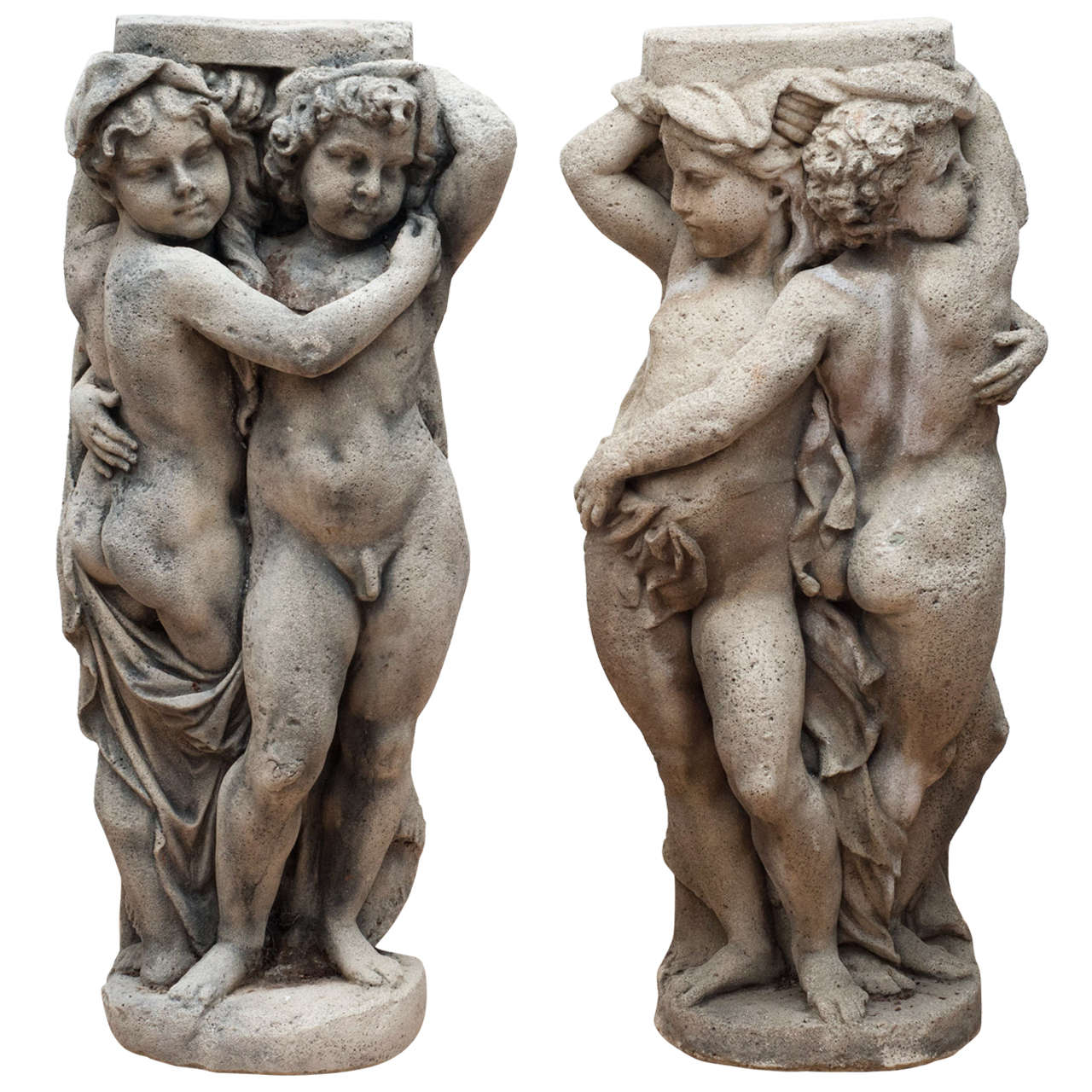 Pair of  Embracing Putti Stone figures For Sale