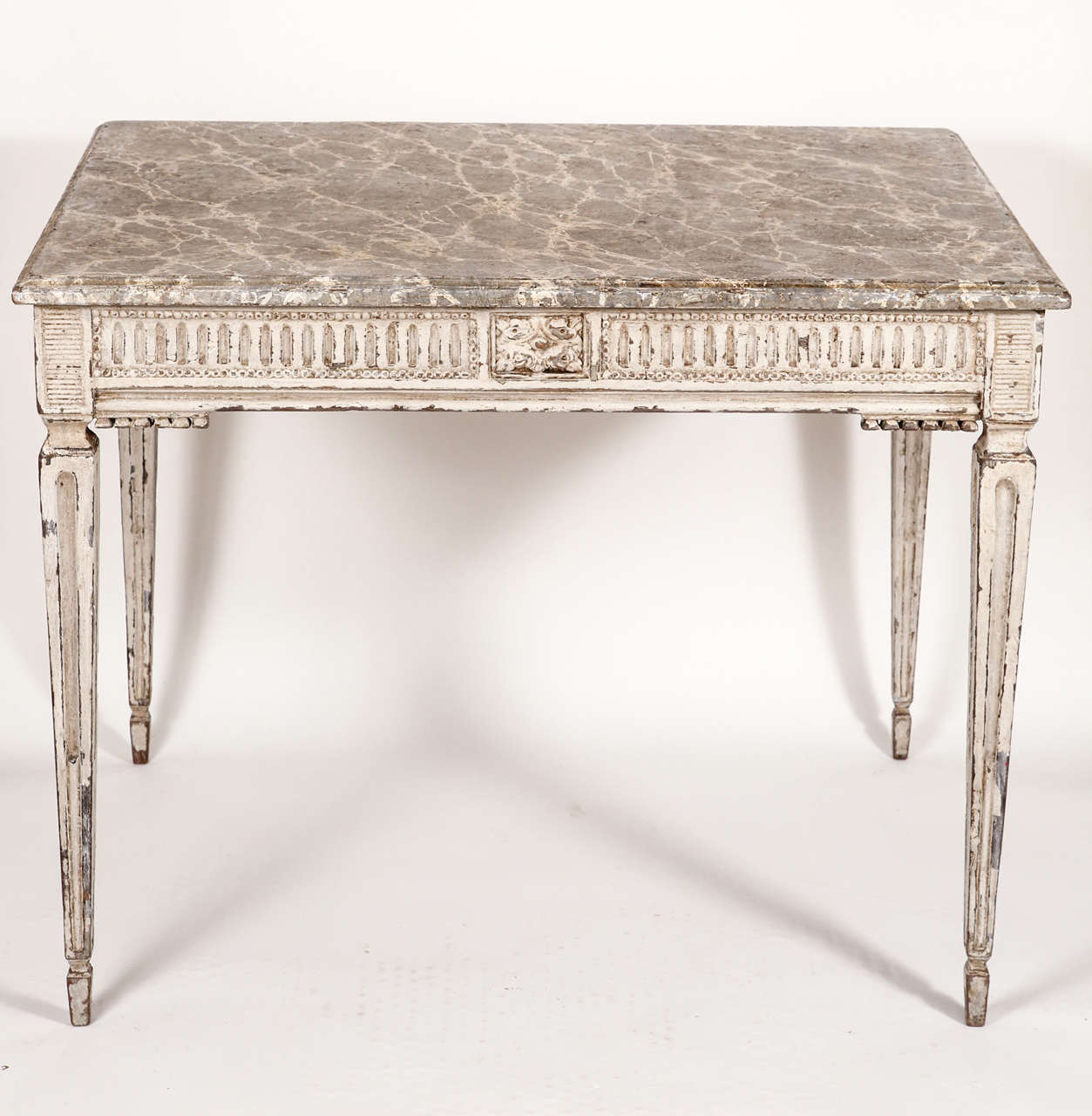 Beautifully painted table with faux marbled top.  Fluted leg and apron detail.  Single drawer with original hardware.  Naturally distressed finish.  Thought to be early 19th century.  Dimensions: 29 1/2