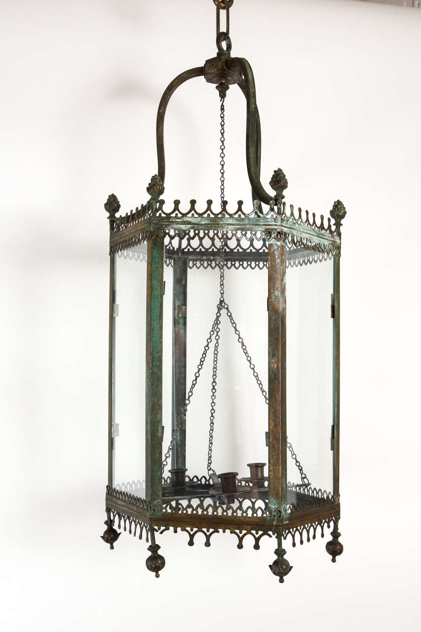 19th. Century French bronze patinated lantern.  Chain included.  Holds three candles.

DIMENSIONS: 13