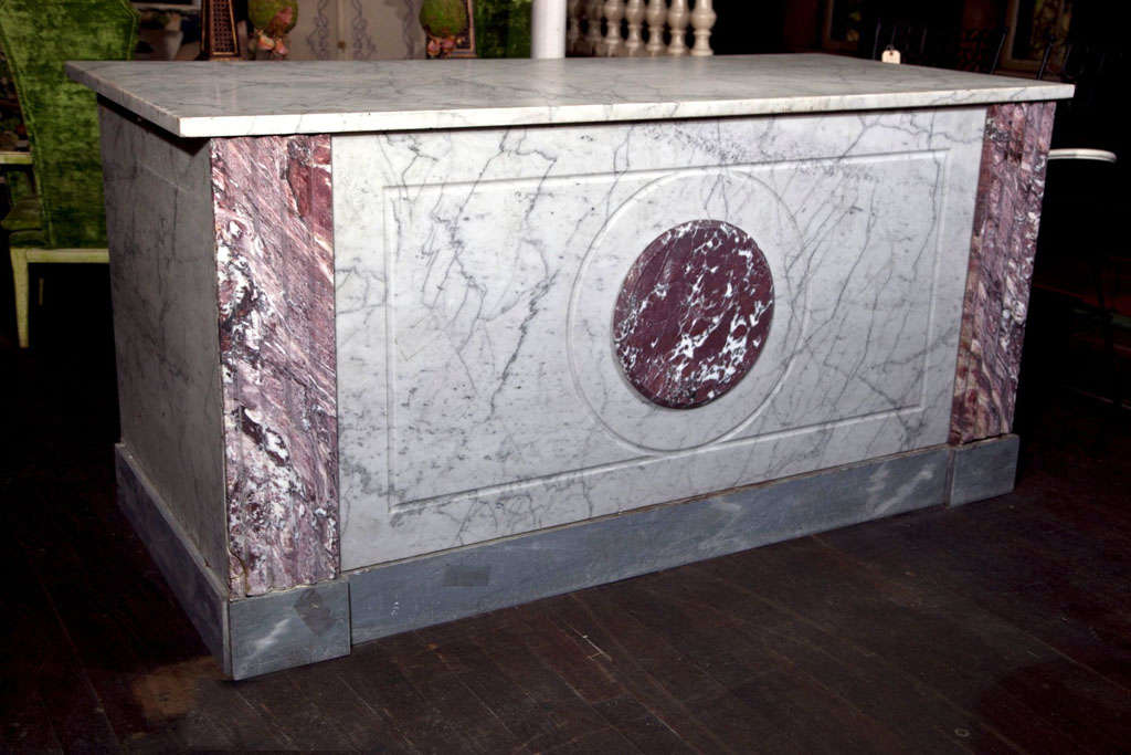 Spectacular carved slab marble counter from a French Boulangerie. This comes with a new wood frame. Actual functioning cabinetry would need to be provided by the buyer.