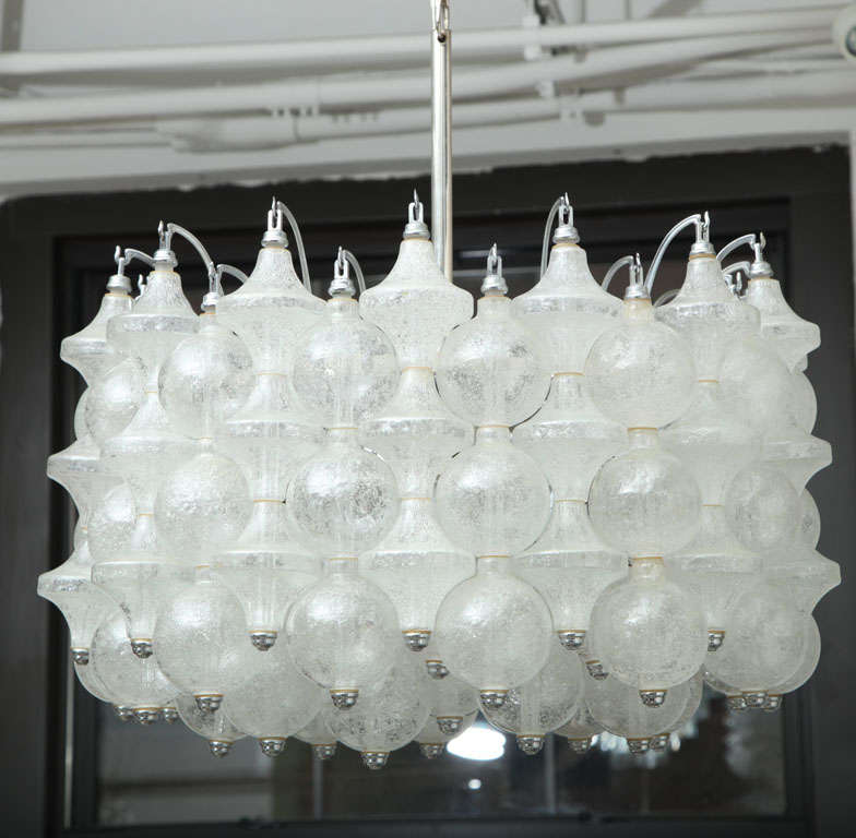 Venini chandelier with murano glass and sterling silver frame.