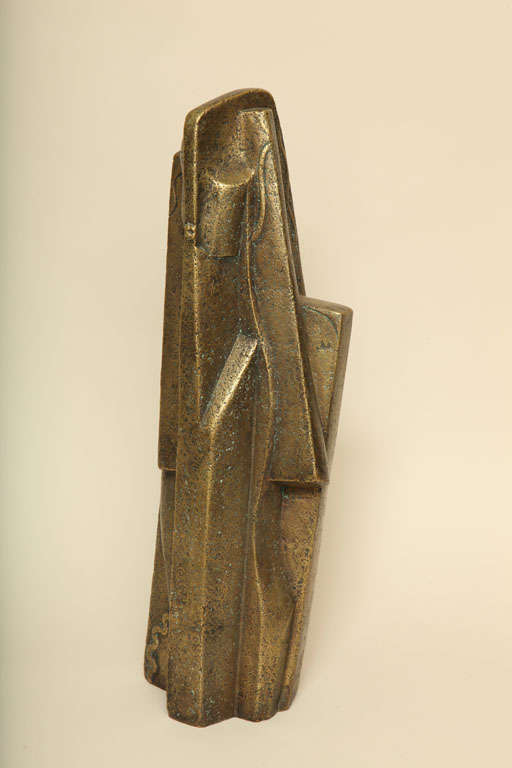 Cubistic bronze sculpture of a woman has a gold patina on a rough surface by Joseph Csaky (1888-1971).
Conceived 1921; cast at a later date by Susse Fondeur in an edition of 6.
Signed: CSAKY 21/ Susse Fondeur Paris with cachet/
E.A. 2/3

Csaky