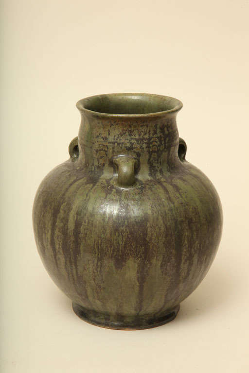 Glazed stoneware vase with three handles by Carl Halier (1873-1948), Copenhagen.
Signed: 19CH27/ Carl Halier triangular studio mark with urn/ 640.

Carl Halier came to Royal Copenhagen in 1913 as a thrower for Patrick Nordstrom who started the