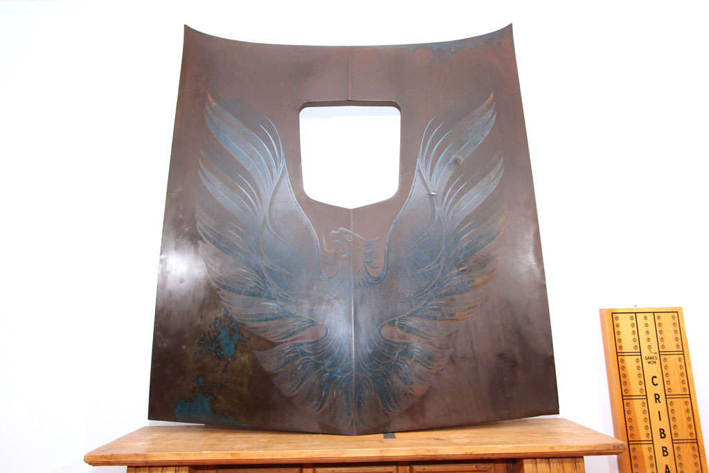 Rescued hood from a vintage Pontiac Firebird Trans-Am with great overall patina and sun-crackled phoenix decal.  Perfect automotive art piece for the mancave, garage or boy's room.