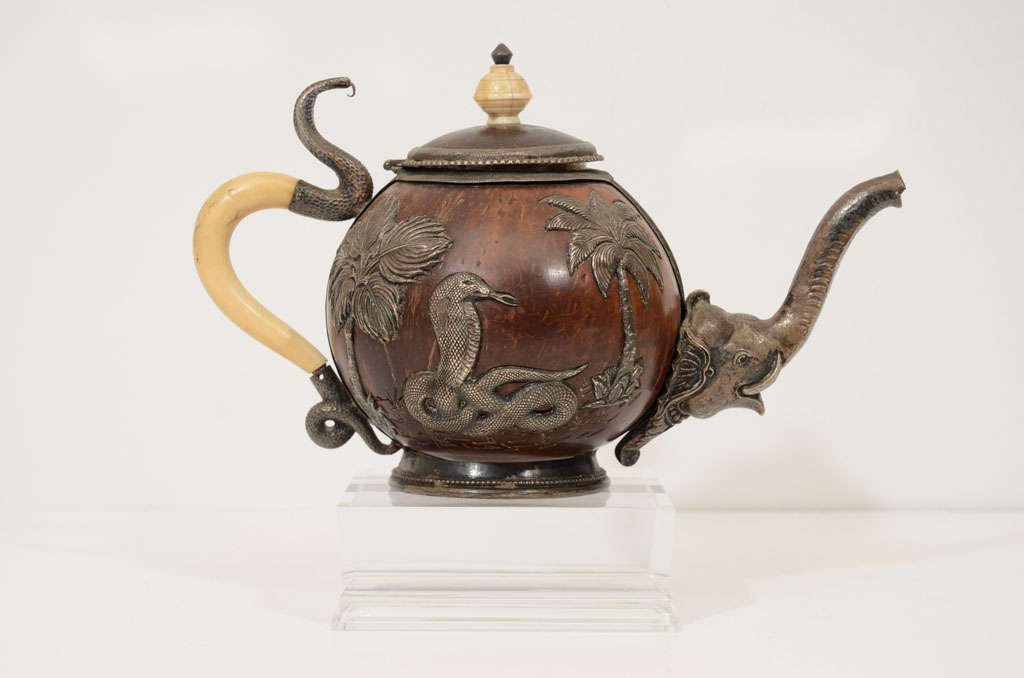Silver and Ivory mounted coconut Teapot with Elphant spout and Ivory handle and Finial.