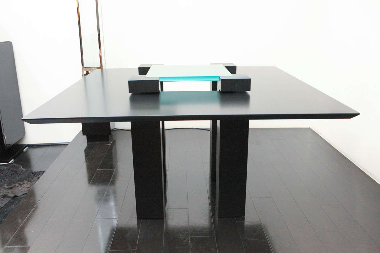 Unique pair of dining or entry tables by Clemmer Heidsieck. Titled 