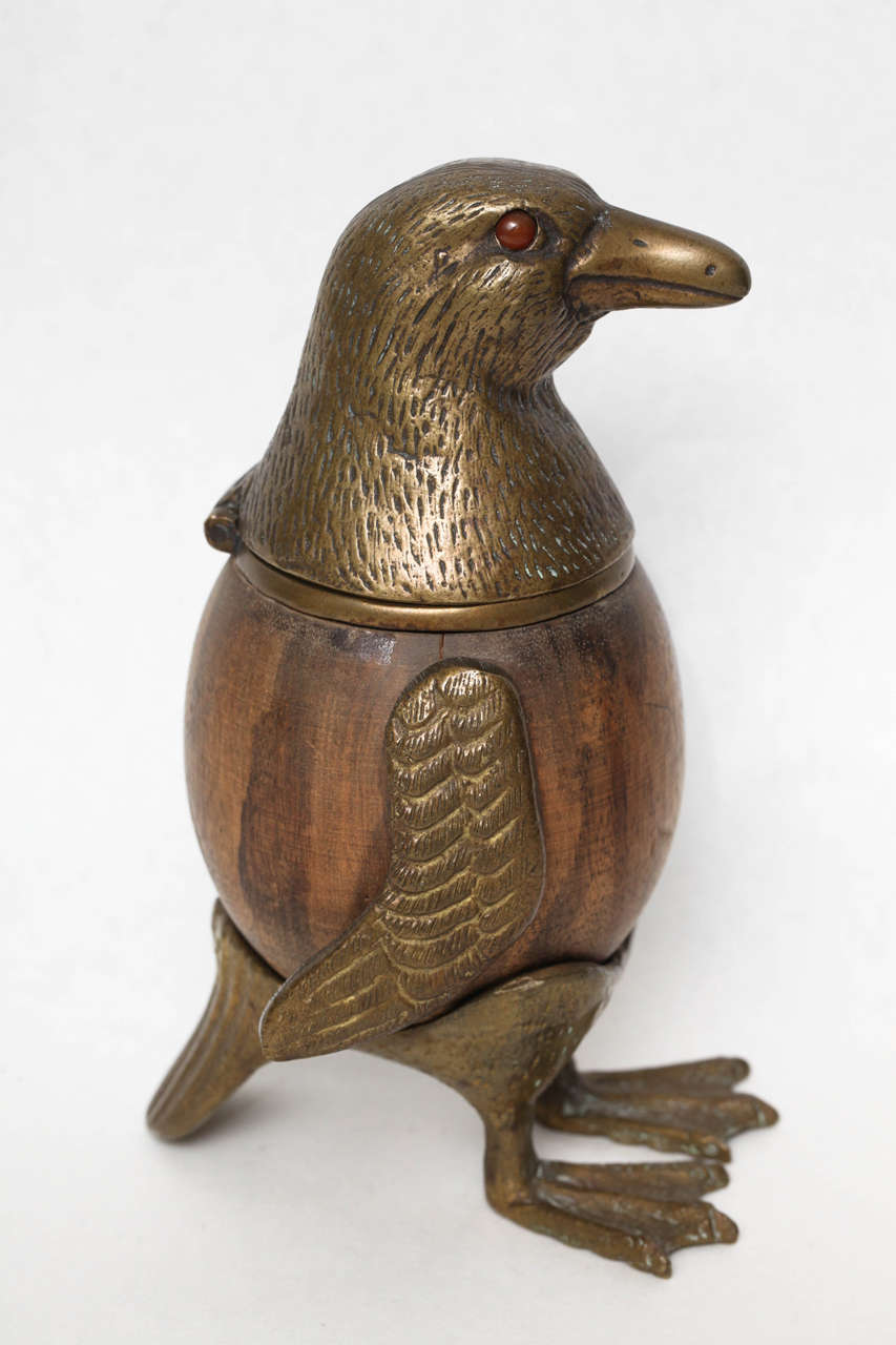 Made of coconut and brass with carnelian eyes. Brass has original patina but could be polished up.

This piece is illustrated in the book Arthur Court Designs (2000).