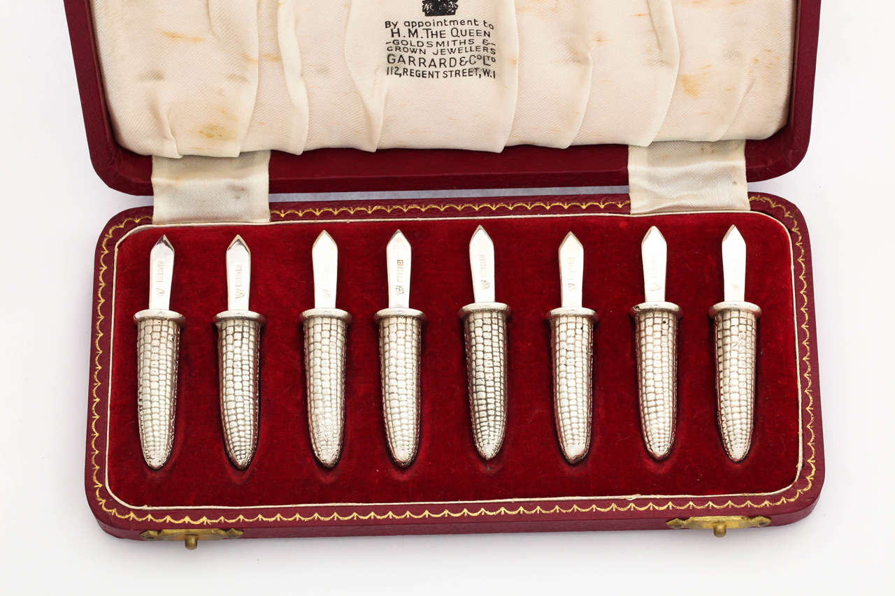 A superb set of four pairs (eight total pieces) of sterling silver, wonderful quality corn on the cob holders. They are made in the form of half an ear of corn, with the small kernels visible, such is the quality in the make. 
Each holder has a