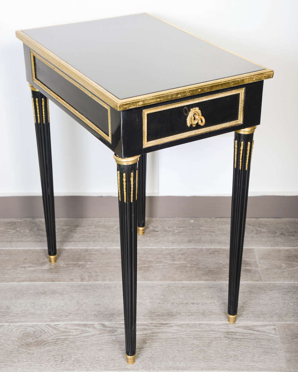 Elegant pair of tables, new lacquered black with bronze elements.
Louis XVI's inspiration, with two originals keys.
By Jansen.