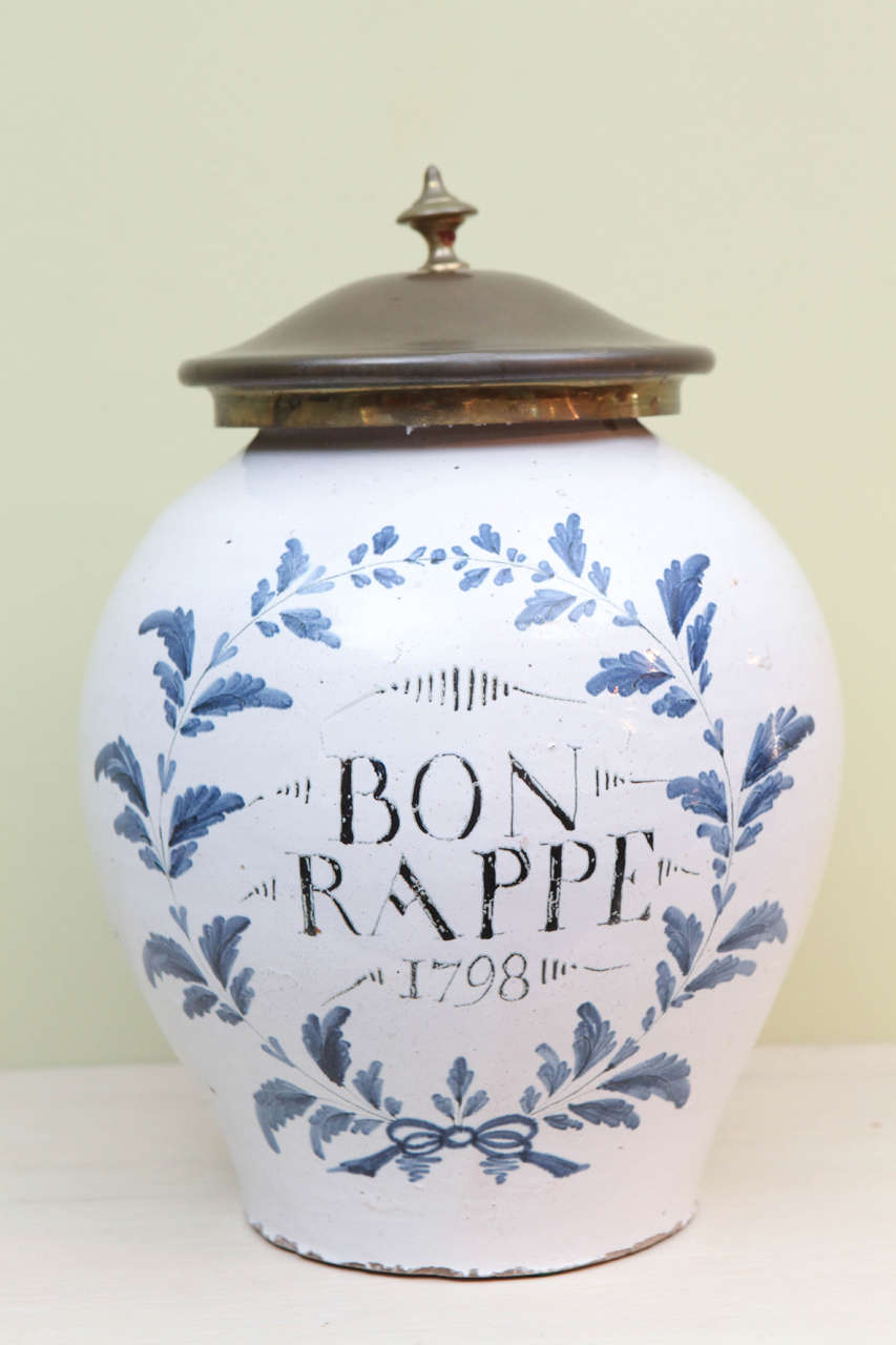 A French faience tobacco jar with lids, circa 1778, marked 