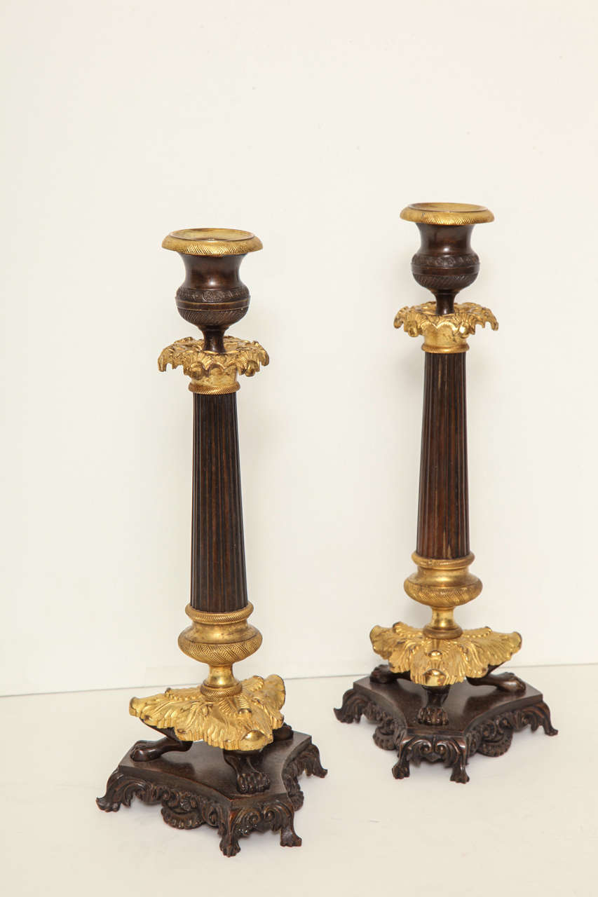 Louis Philippe Black and Gilt Bronze Candlesticks