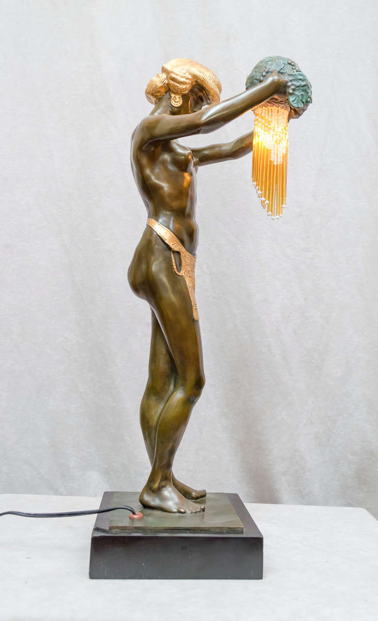 This incredible bronze sculpture is one of the most interesting we have come across in a long time. It has the feeling of a Gustav Klimt painting. Delilah holding the hair of Samson, what a great subject. It was always a lamp, and has been newly