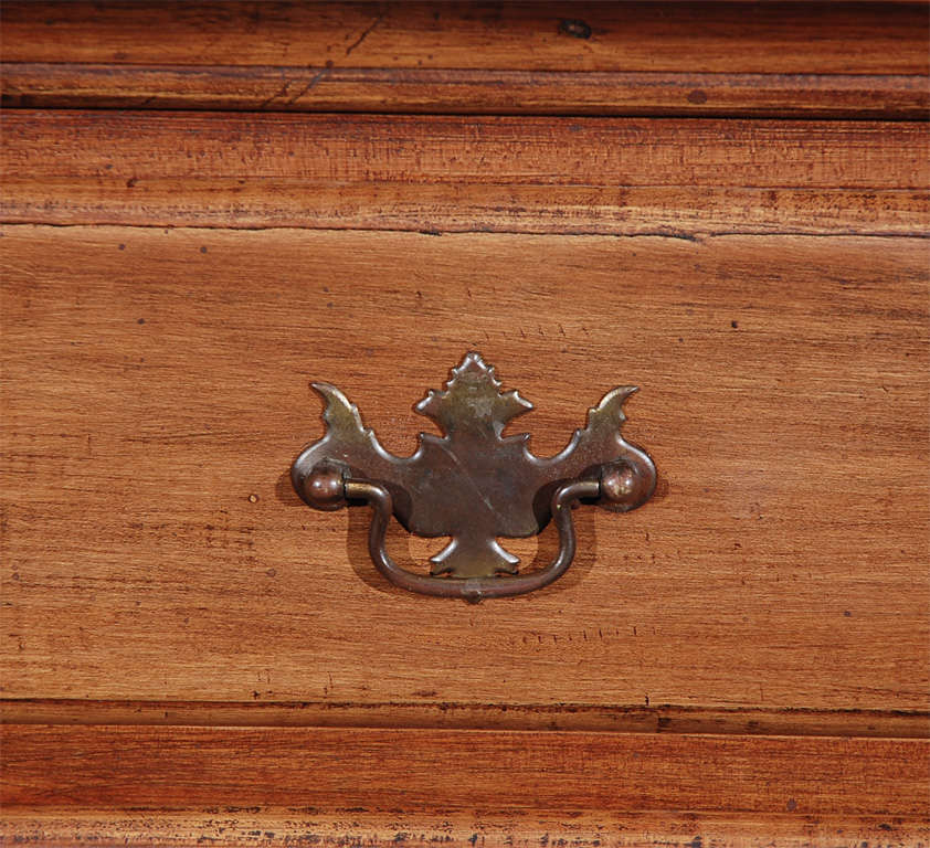 EARLY AND VERY BEAUTIFUL 18THC TALL CHEST OF DRAWERS ON SUPER TALL CUT OUT FEET.THIS HANDSOME CHEST OF DRAWERS HAS GREAT CONSTRUCTION WITH A DOVETAILED CASE AND DOVETAILED DRAWERS.THE DRAWER PULLS ARE BRASS AND DIMINUTIVE,PROBABLY REPLACED IN THE