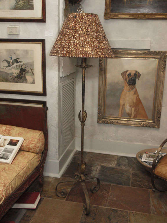 Great looking iron floor lamp from France, in working order, with custom made pheasant feather shade from England.