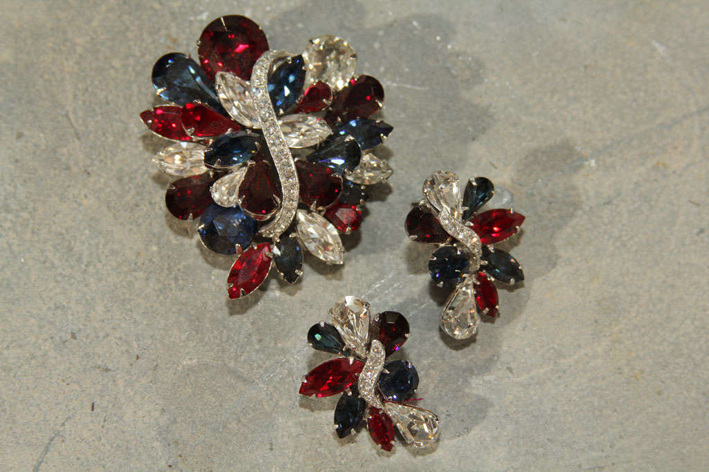 lovely sapphire and ruby colored pin and earring set by Eisenberg