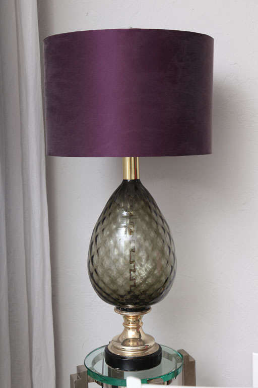 Stunning grey glass table lamp with plum silk shade.
