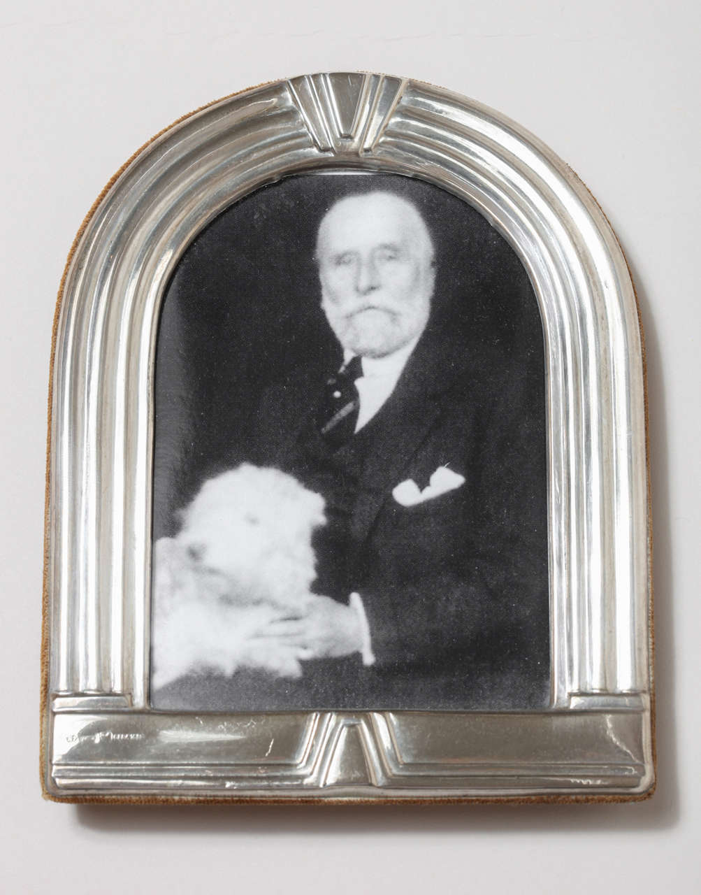 Silver photograph frame with rounded top repousse design. 
Hallmarks:  925 silver/ AL/ saddle/ CESA 1882

*Variety of other Art Deco silver picture frames available.