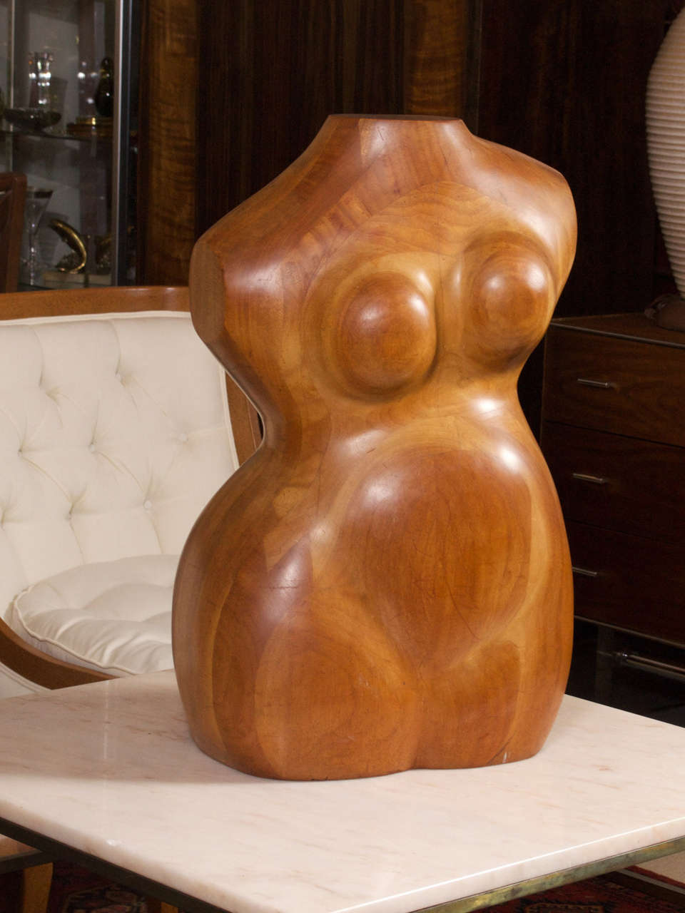 An unsigned rubinesque female torso sculpture, it's a wood block construction. The artist was Ethel Schochet, we believe from the state of Minnesota. This sculpture would make a wonderful focal point in your modern home.