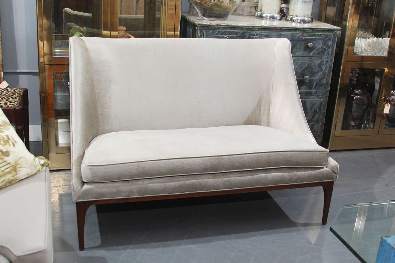 Sleek Mid-Century sofa reupholstered in pale grey silk velvet.