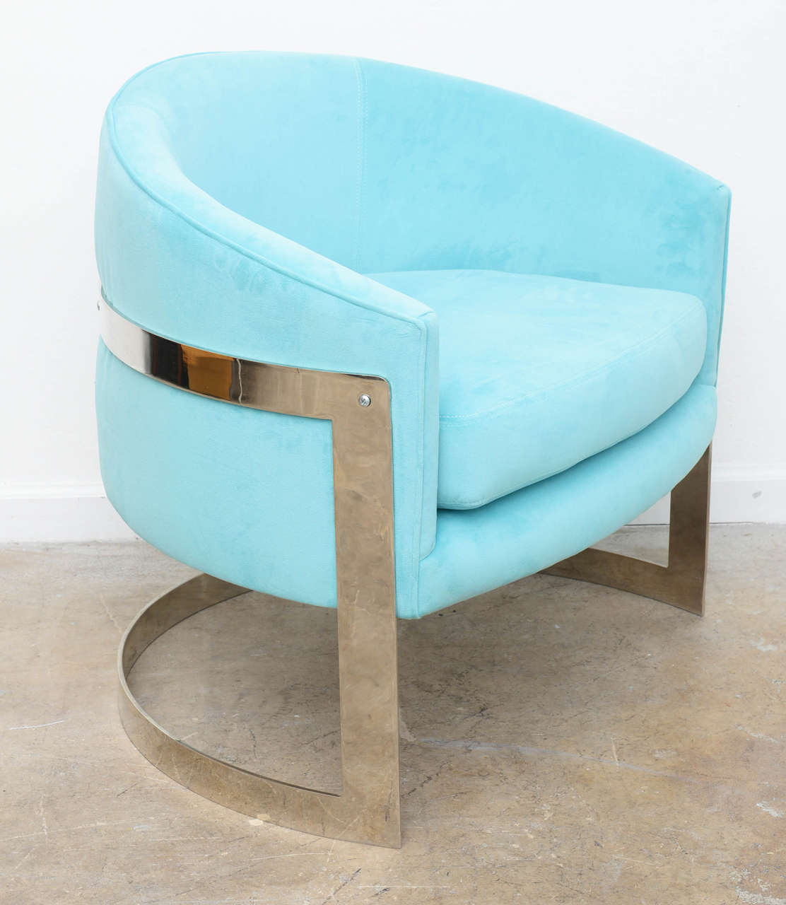 These amazing barrel chairs were designed in the 1970s by Milo Baughman for Thayer Coggin. Although we only photographed four chairs we have left two chairs. They are priced at $3800 per pair They have all been refoamed and upholstered in an aqua