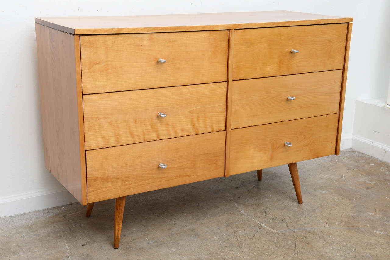 Great piece for a contemporary or Midcentury Modern  Interrior . This piece has been restore back to its original state. It's signed on top left drawer .