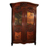 Painted and carved oak armoire
