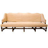 A OVERSIZED FRENCH CANAPE/SOFA WITH WALNUT FRAME
