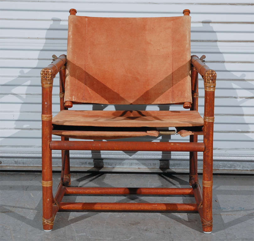 pair of leather wrapped rattan armchair with suede
