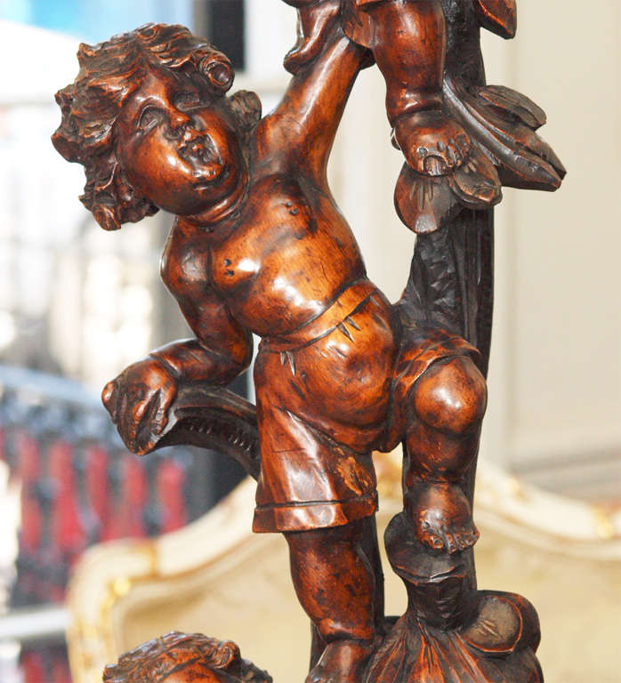 Italian Carved Walnut Stand With Three Putti For Sale 1