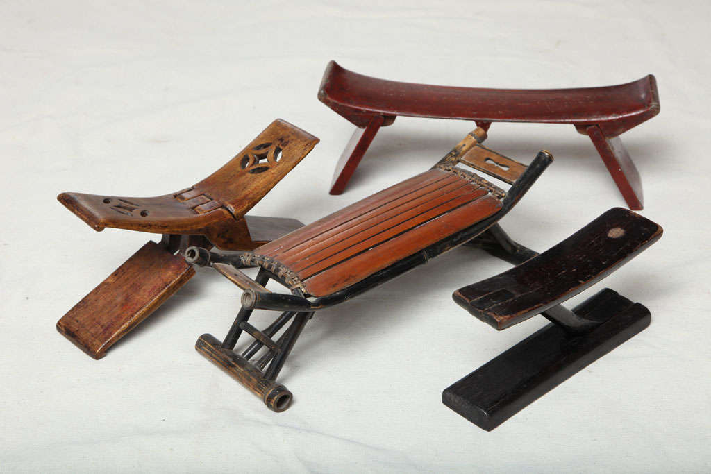 A rare set of 4 Chinese folding head rests, priced as a set of 4.