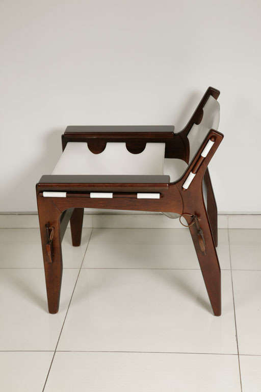 This piece is a genuine reproduction of Sergio Rodrigues' Kilin chair, originally designed in 1973.