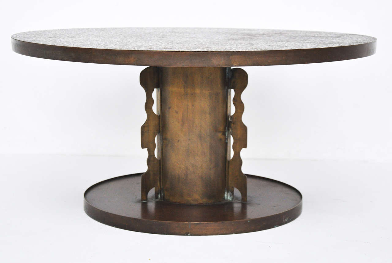 Dining/center table by Phillip and Kelvin Laverne. Etruscan pattern top in bronze.