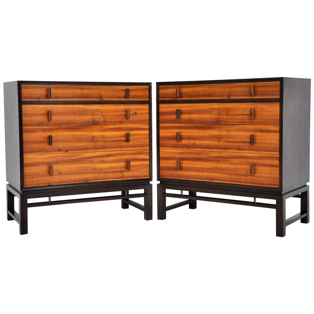 Pair of 4 drawer chest by Edward Wormley for Dunbar.  Dark finish mahogany cases.  French walnut drawers with rosewood pulls.