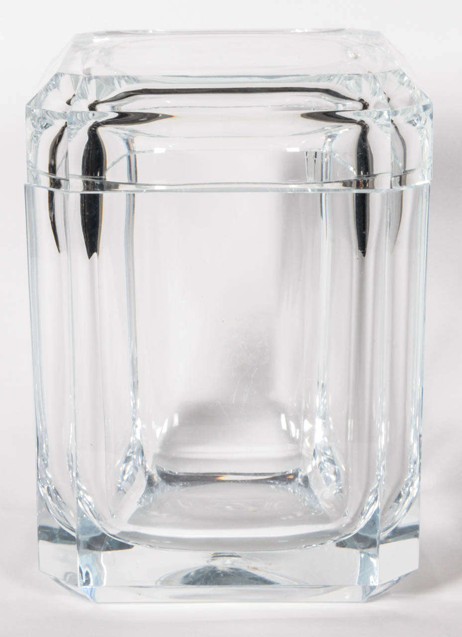 Lucite cube-shaped ice bucket.  Italy, circa 1970.

Features a lid that pivots and is also removable.