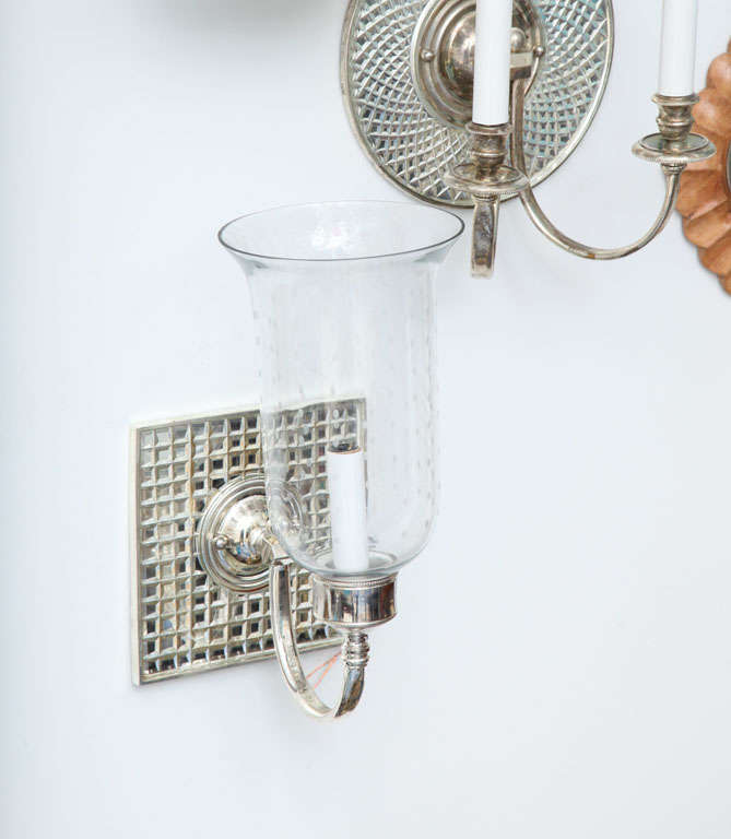 square shaped etched mirrored sconces with glass globes