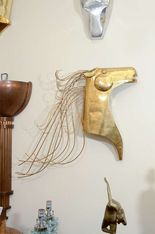 Pair of brass horse head bust wall-mounted sculptures by Curtis Jere with flowing brass mane. In the Austrian art form of Hagenauer.

 