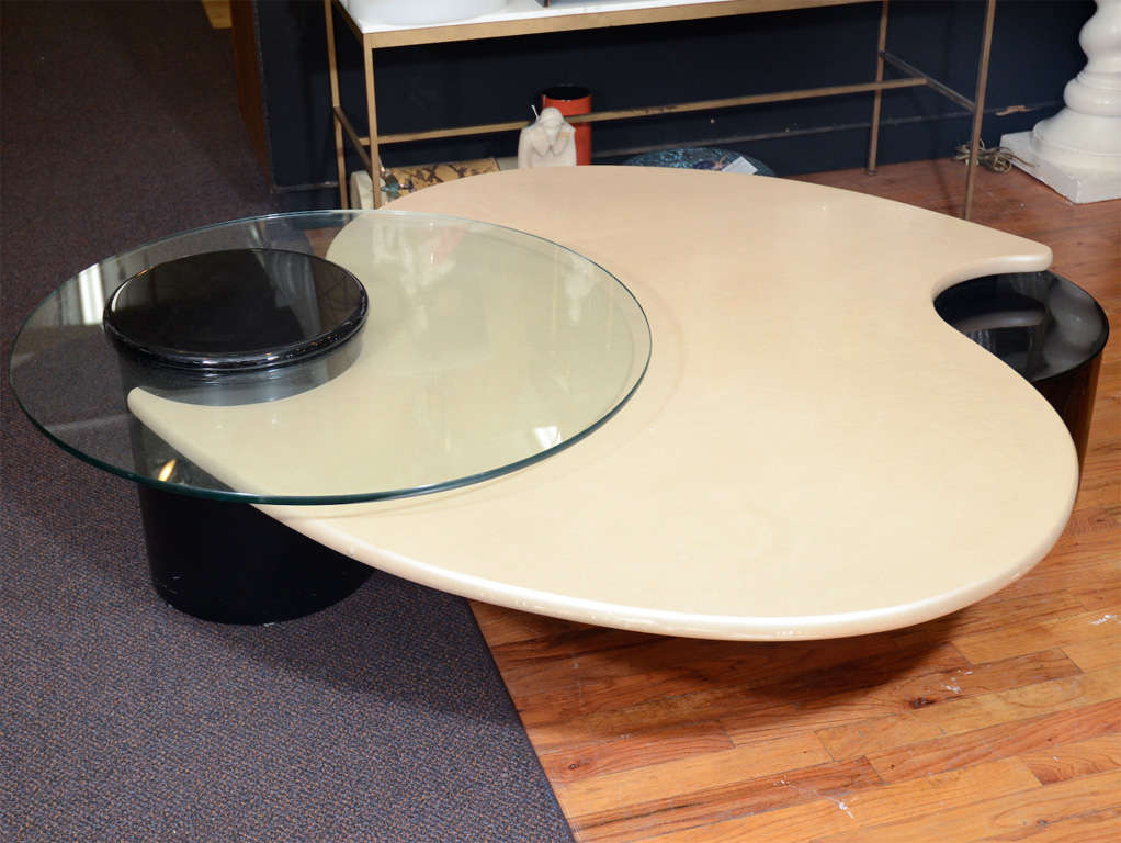 A unique vintage coffee or cocktail table by Rougier. The piece has an organically curved abstract design.